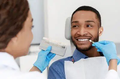 Front desk greeting a cosmetic dentistry patient